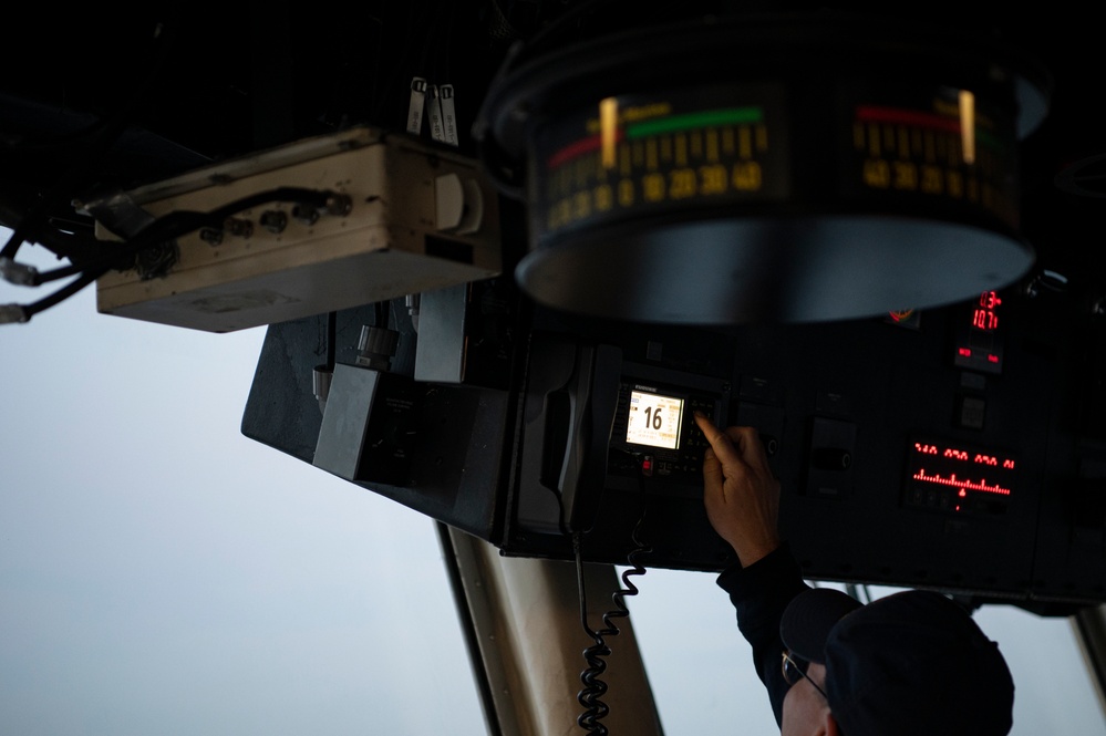 Coast Guard Cutter Hamilton crewmembers navigate from the bridge while underway in the English Channel