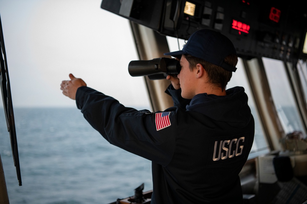 Coast Guard Cutter Hamilton crewmembers navigate from the bridge while underway in the English Channel