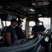 Coast Guard Cutter Hamilton crewmembers navigate from the bridge while underway in the English Channel