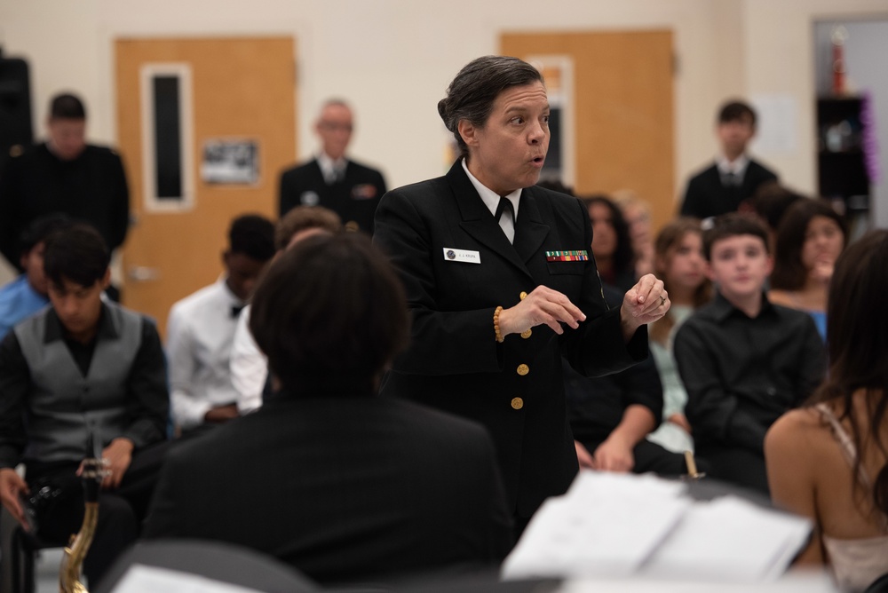 Senior Chief Musician Jennifer Krupa presents a clinic at Paschal High School.