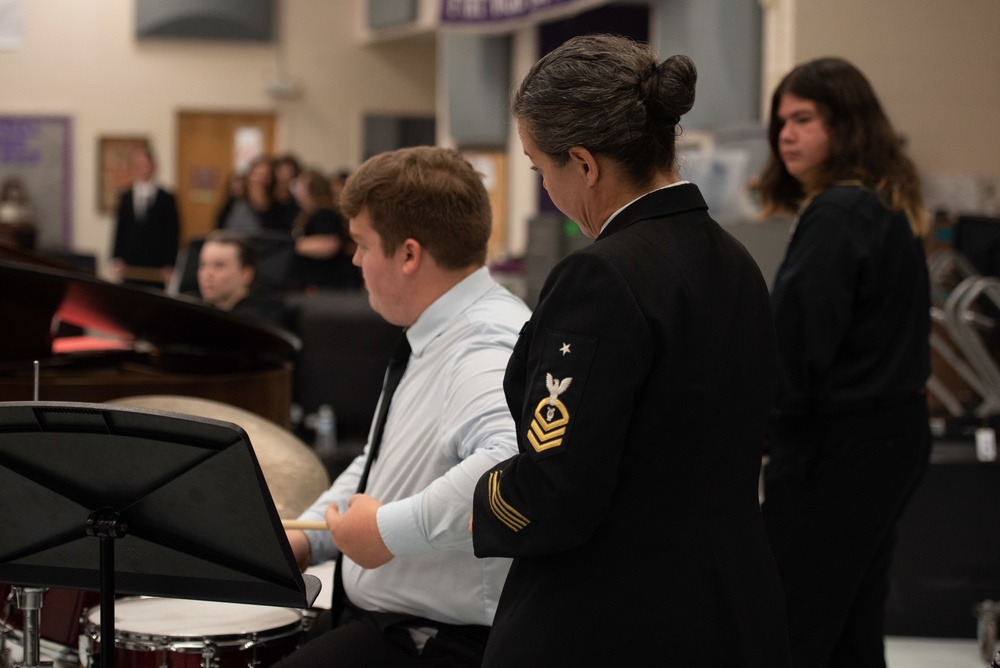 Senior Chief Musician Jennifer Krupa presents a clinic at Paschal High School.