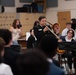 Senior Chief Musician Jennifer Krupa presents a clinic at Paschal High School.