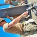 Builder 2nd Class Ethan Adams, prepares concrete for Gas Cylinder Storage 19-851.