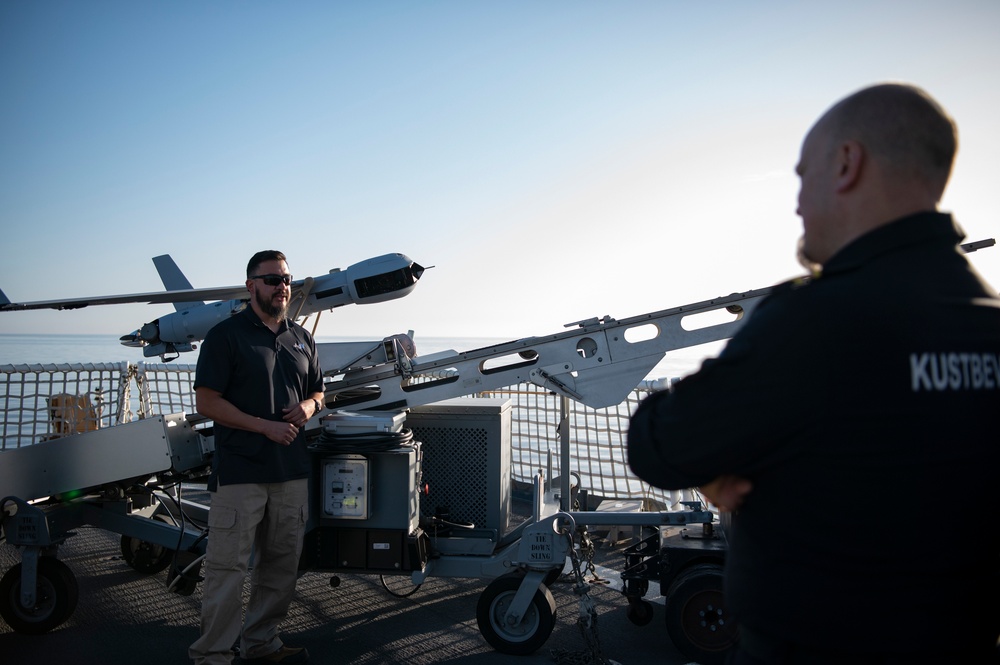 U.S. Coast Guard Cutter Hamilton welcomes aboard members of the Swedish Coast Guard while underway in the Baltic Sea