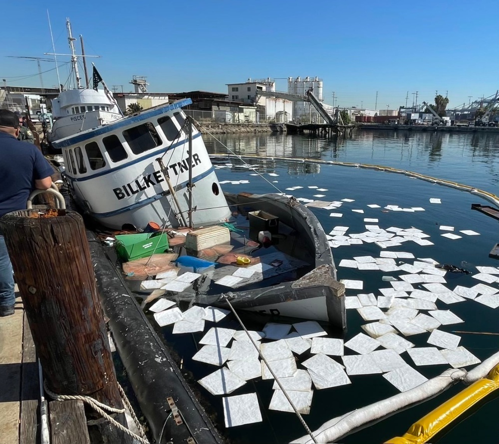 Coast Guard conducts oil recovery from sunken fishing vessel