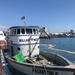Coast Guard conducts oil recovery from sunken fishing vessel