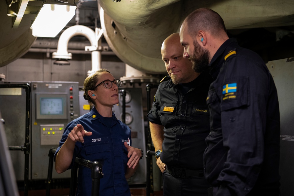 U.S. Coast Guard Cutter Hamilton welcomes aboard members of the Swedish Coast Guard while underway in the Baltic Sea