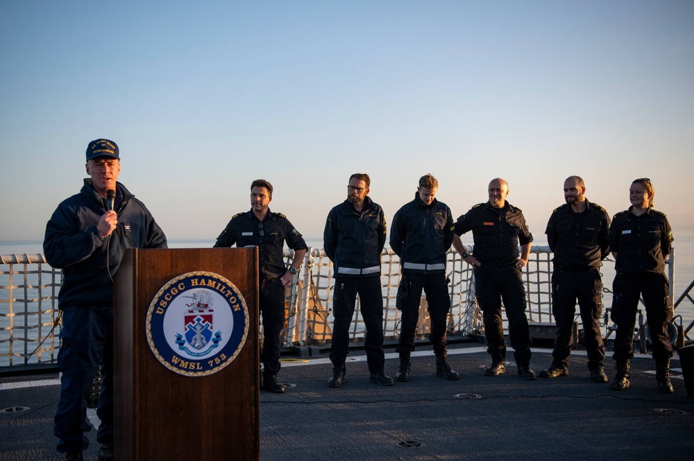 U.S. Coast Guard Cutter Hamilton welcomes aboard members of the Swedish Coast Guard while underway in the Baltic Sea