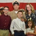 Chief Air Traffic Controlman Mark Flores, assigned to Naval Air Station (NAS) Joint Reserve Base (JRB) Fort Worth, was pinned by his family during a chief petty officer pinning ceremony