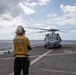 HSC-21 Helicopter Lands on USS New Orleans during Operations with USS Ronald Reagan in the Philippine Sea