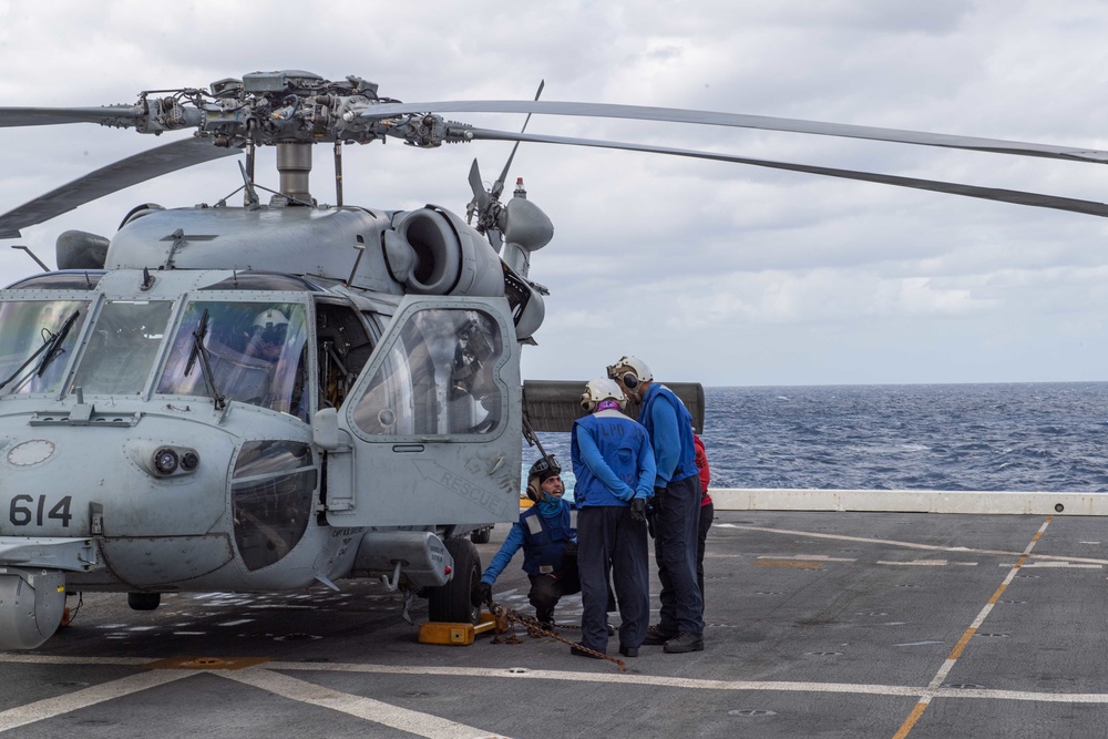 HSC-21 Helicopter Lands on USS New Orleans during Operations with USS Ronald Reagan in the Philippine Sea