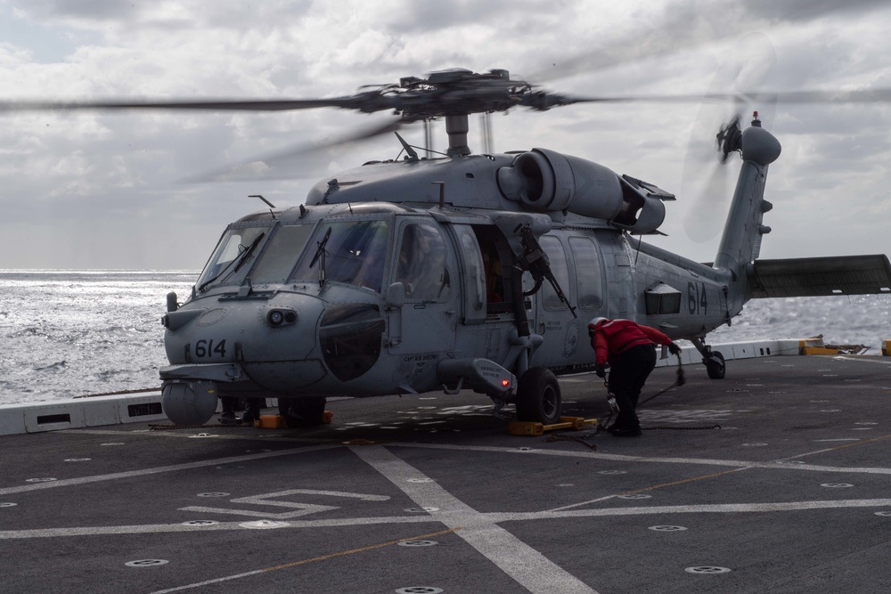 HSC-21 Helicopter Lands on USS New Orleans during Operations with USS Ronald Reagan in the Philippine Sea