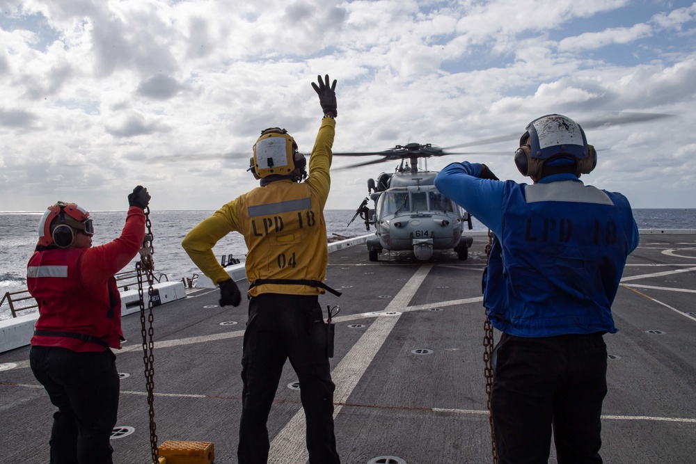 HSC-21 Helicopter Lands on USS New Orleans during Operations with USS Ronald Reagan in the Philippine Sea