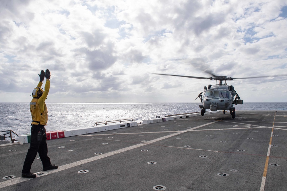 HSC-21 Helicopter Lands on USS New Orleans during Operations with USS Ronald Reagan in the Philippine Sea