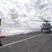 HSC-21 Helicopter Lands on USS New Orleans during Operations with USS Ronald Reagan in the Philippine Sea