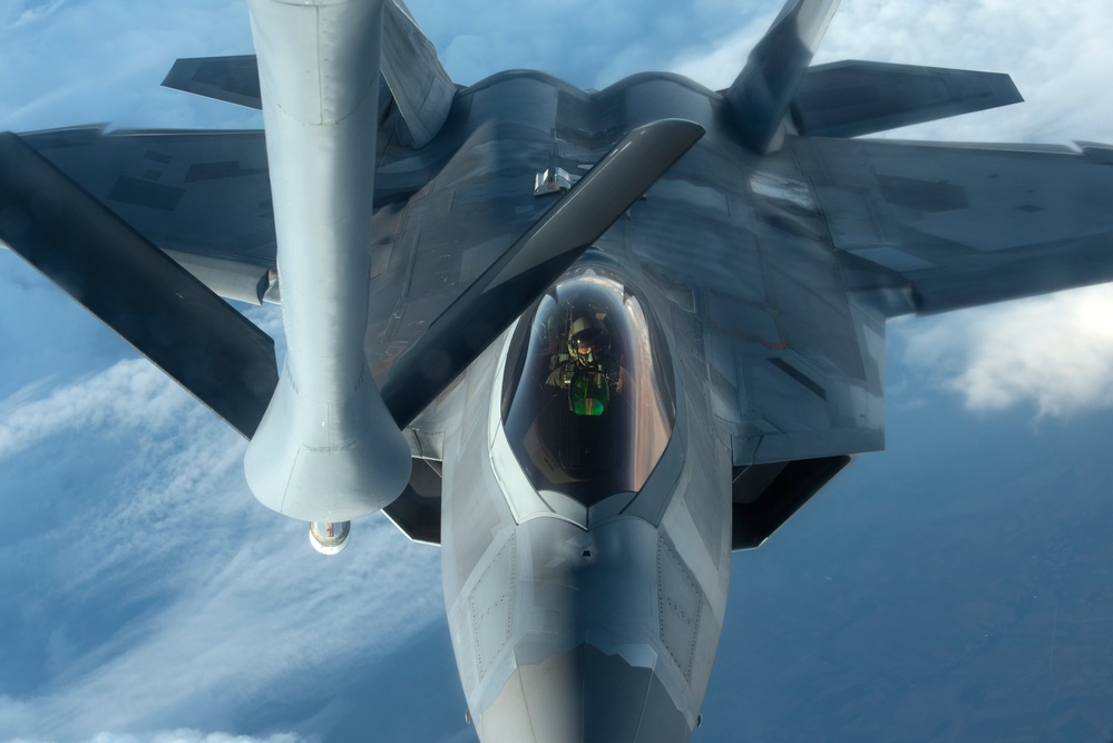 KC-135 refuels F-22s during Air Shielding