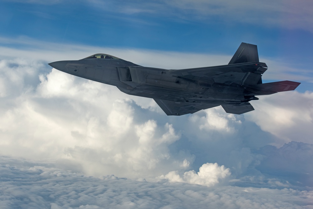 KC-135 refuels F-22s during Air Shielding