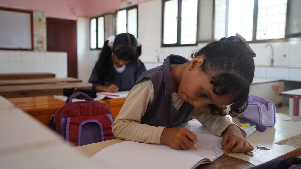 A girl students deepens her artistic and writing skills in Yemen