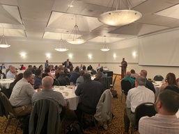 NAVSUP FLC San Diego leadership addresses supervisors during in-person offsite.