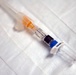 60th AMW commander rolls up sleeve for flu shot