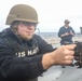 Sailor Fires Machine Gun