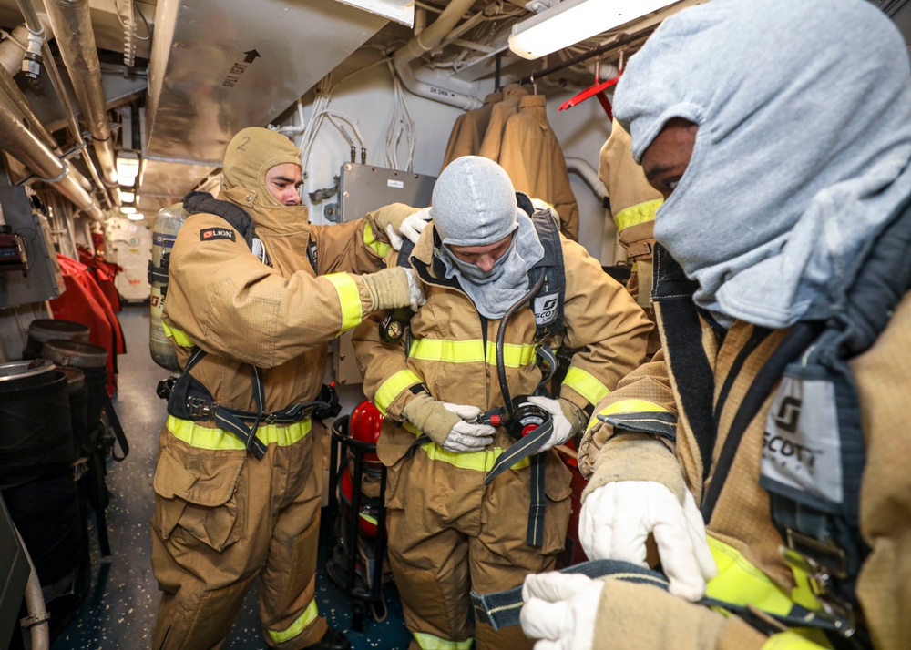 DVIDS - Images - Sailors Don Firefighting Gear [Image 1 of 6]