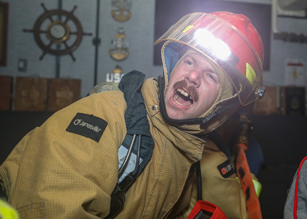 Sailor Fights Simulated Fire