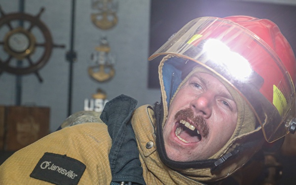 Sailor Fights Simulated Fire