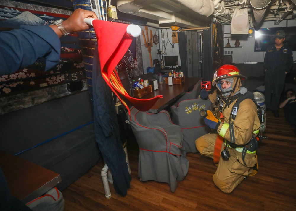 Sailors Fight Simulated Fire