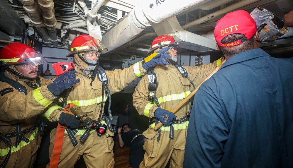 Sailors Fight Simulated Fire