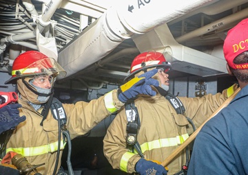 Sailors Fight Simulated Fire