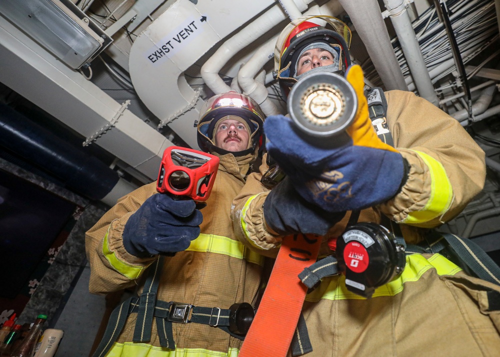 Sailors Fight Simulated Fire