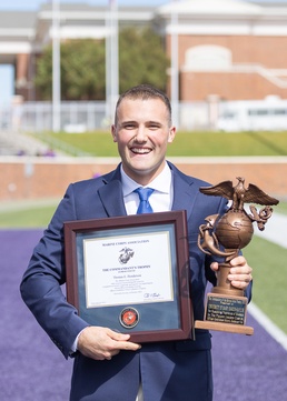 Candidate Henderson receives the Commandants Trophy
