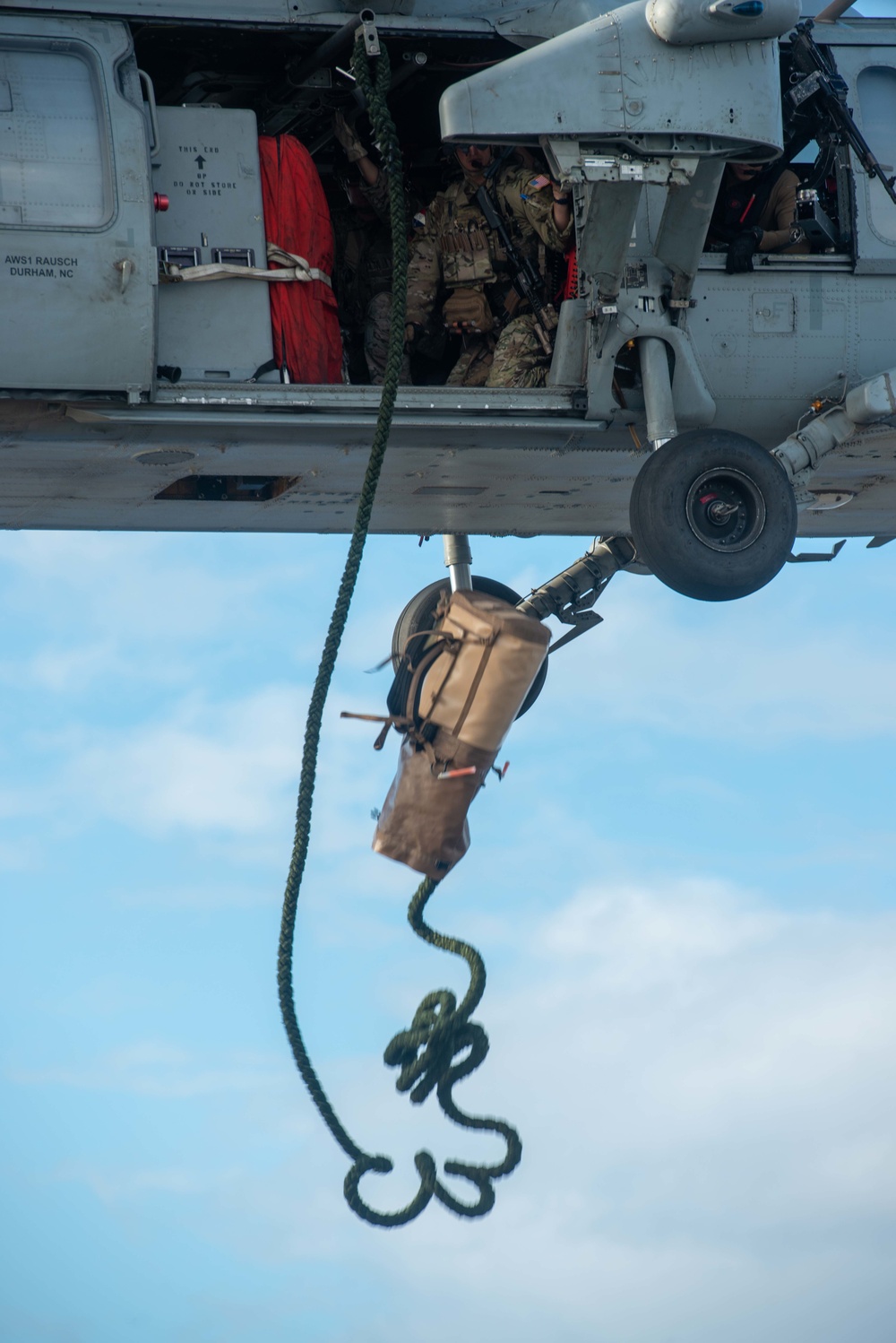 Explosive Ordnance Disposal Mobile Unit 5 conducts maritime interdiction training with Helicopter Sea Combat Squadron (HSC) 12