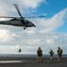 Explosive Ordnance Disposal Mobile Unit 5 conducts maritime interdiction training with Helicopter Sea Combat Squadron (HSC) 12