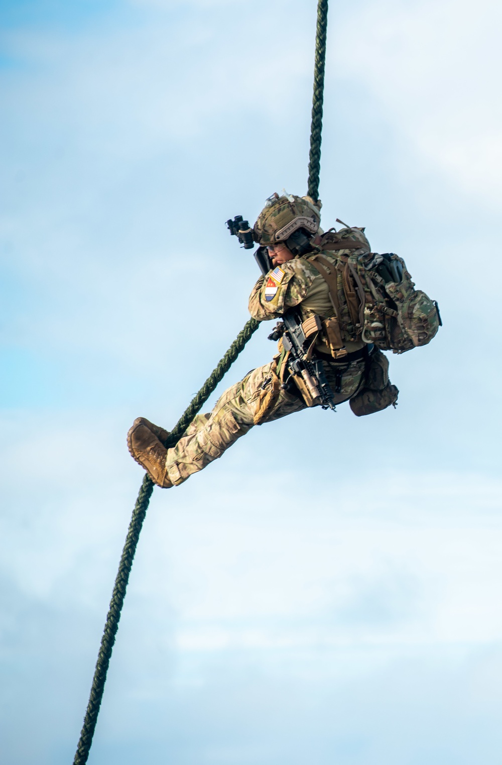 Explosive Ordnance Disposal Mobile Unit 5 conducts maritime interdiction training with Helicopter Sea Combat Squadron (HSC) 12