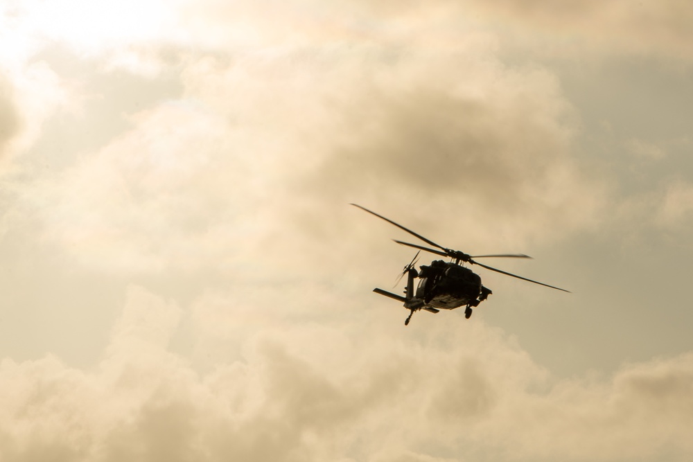 Explosive Ordnance Disposal Mobile Unit 5 conducts maritime interdiction training with Helicopter Sea Combat Squadron (HSC) 12