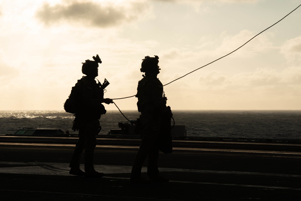 Explosive Ordnance Disposal Mobile Unit 5 conducts maritime interdiction training with Helicopter Sea Combat Squadron (HSC) 12