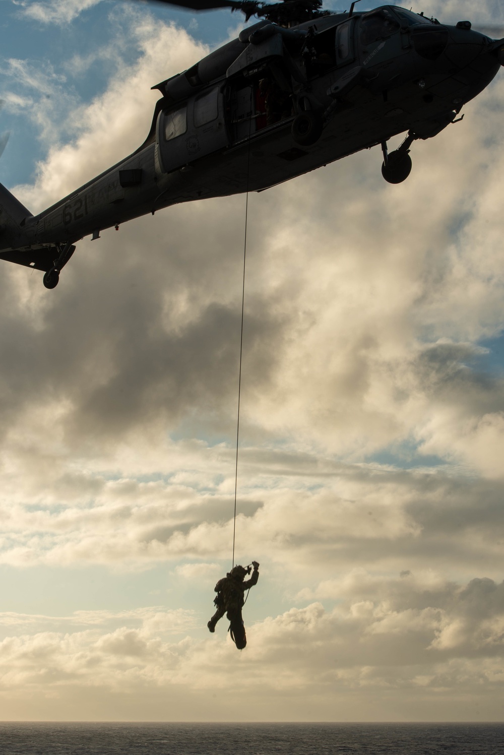 Explosive Ordnance Disposal Mobile Unit 5 conducts maritime interdiction training with Helicopter Sea Combat Squadron (HSC) 12