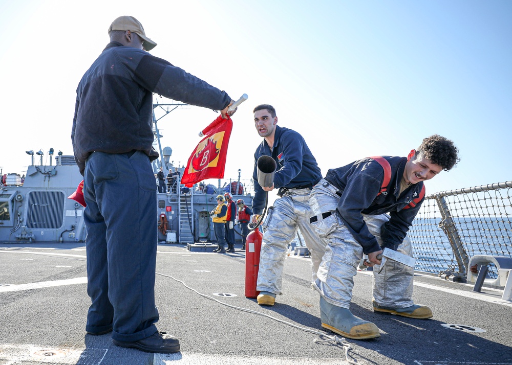 Sailors Fight Simulated Fire