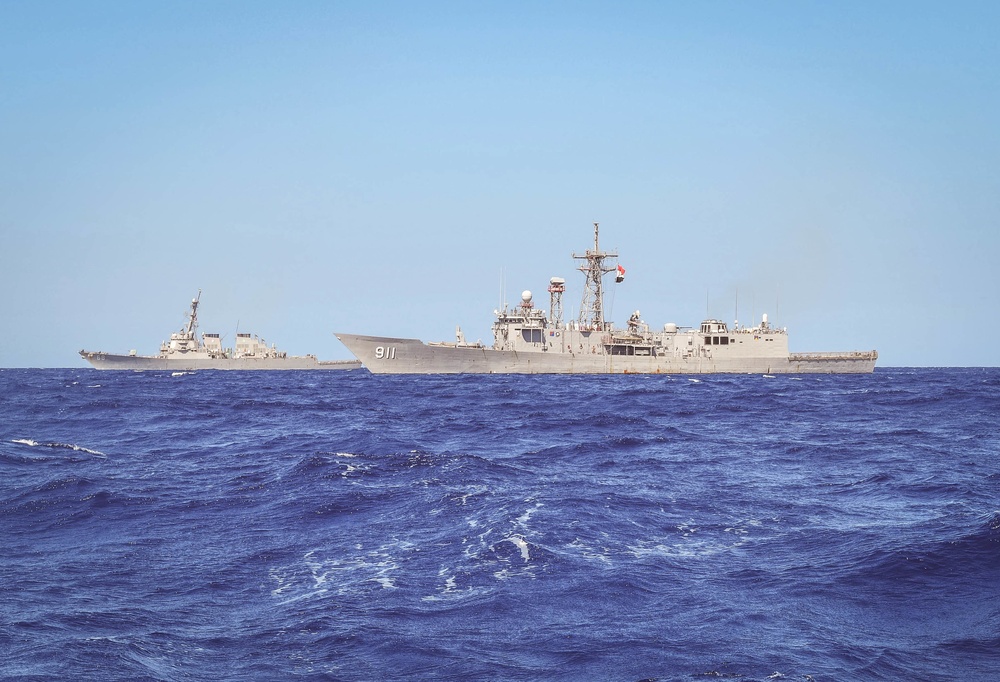 USS The Sullivans sails with ENS Alexandria