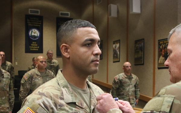 Sgt. 1st Class Donald Swain is awarded the Army Achievement Medal