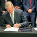 Massachusetts Governor Charlie Baker signs SPEED Act at Massachusetts National Guard Headquarters