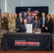 Massachusetts Governor Charlie Baker signs SPEED Act at Massachusetts National Guard Headquarters