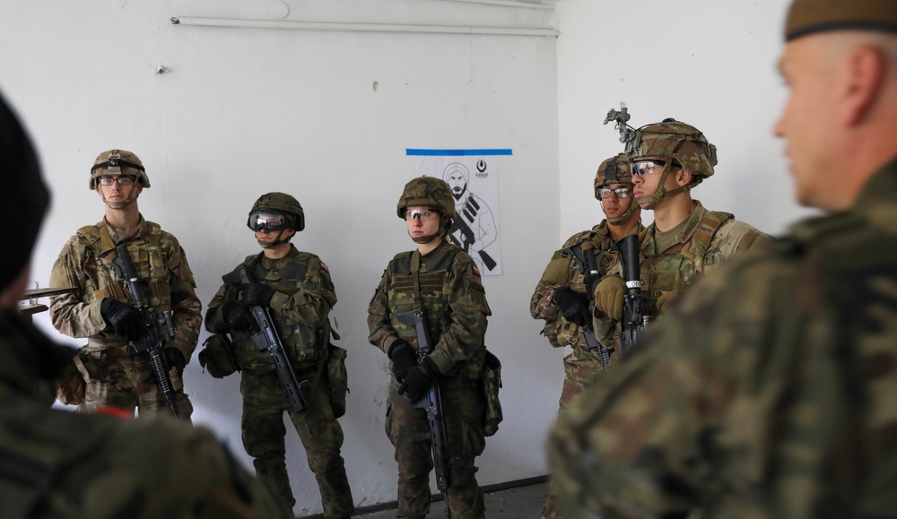 eFP Battle Group Poland Train As They Fight During Urban Operations