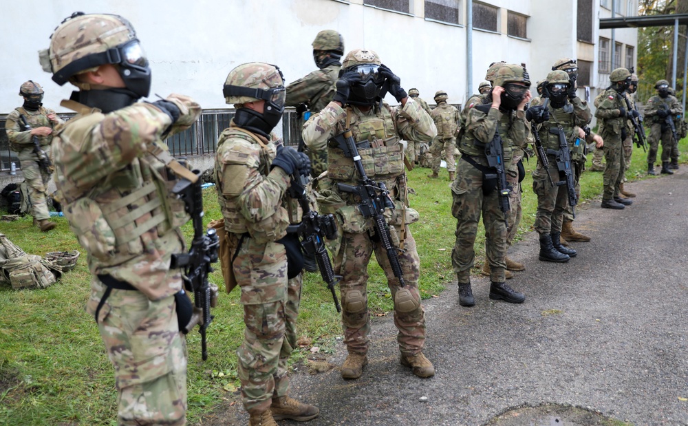 eFP Battle Group Poland Train As They Fight During Urban Operations