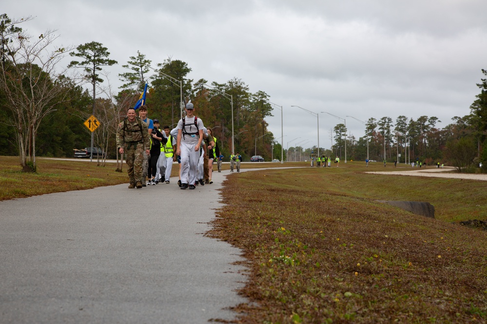 AFJROTC Cadets participate in a 15-mile hike abroad MCB Camp Lejeune
