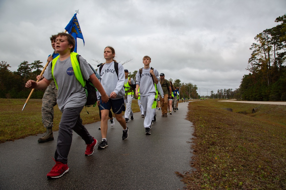 AFJROTC Cadets participate in a 15-mile hike abroad MCB Camp Lejeune