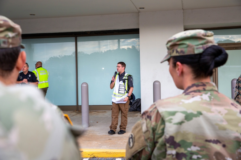 Operations Battalion Chief of Atlanta-Fulton County Emergency Management Agency addresses participants in Exercise Vista Forge