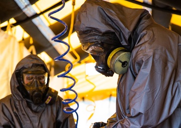 Marine CBIRF members conducts decontamination rinsing during Exercise Vista Forge